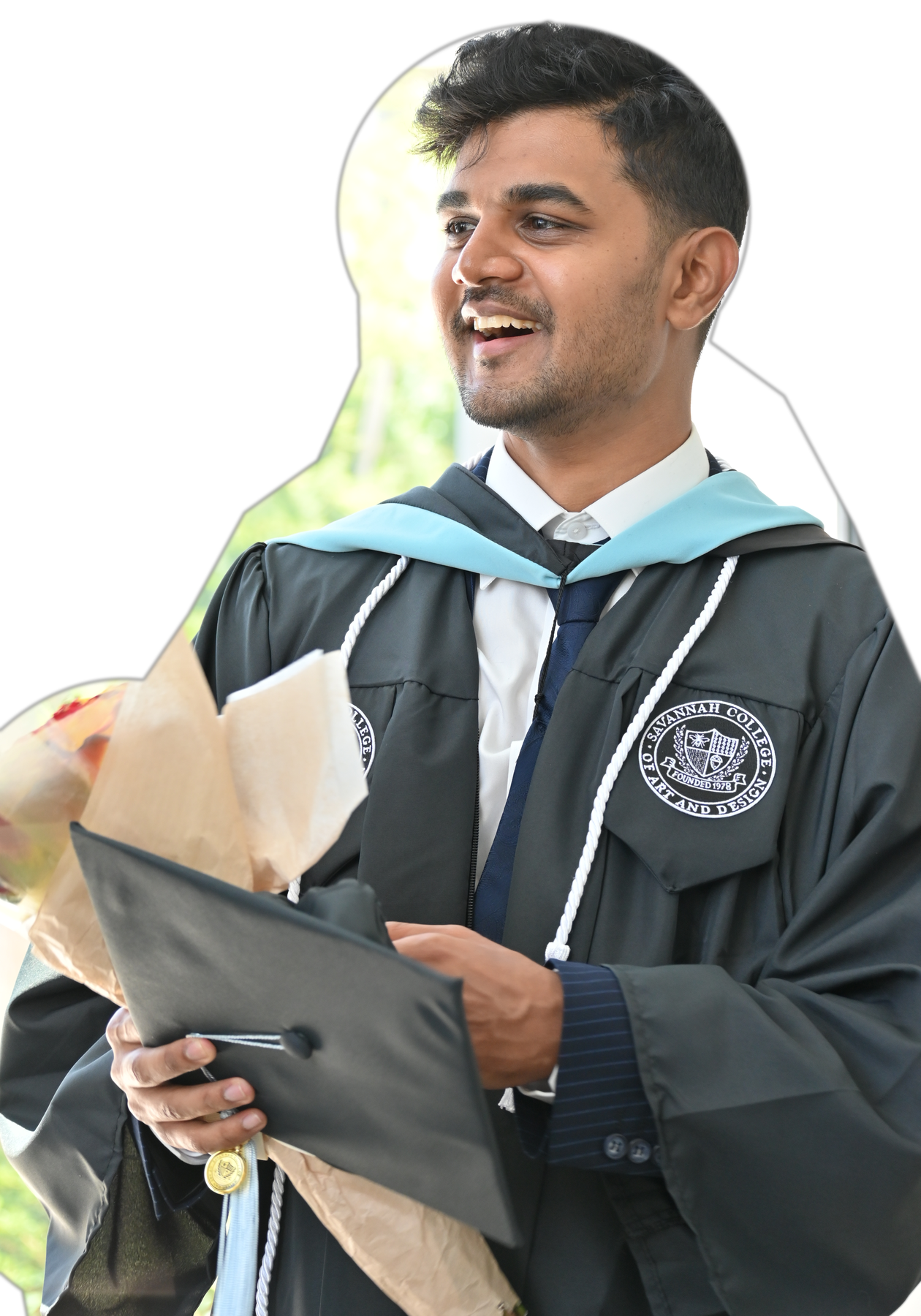 Jaswanth in his SCAD graduation robe