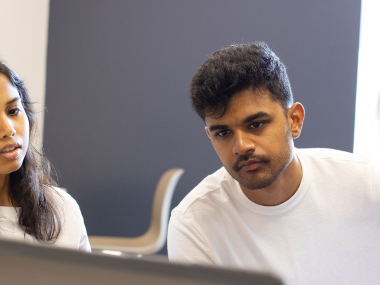 Jaswanth collaborating with a teammate